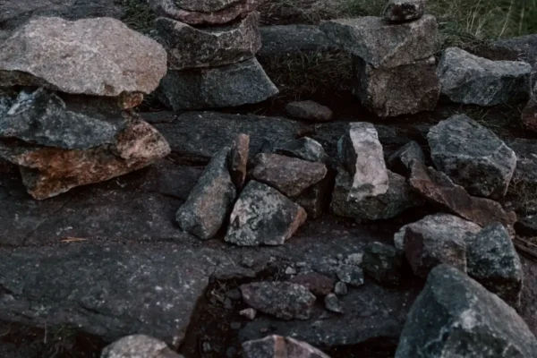 Balanced stack of stones outdoors at dusk